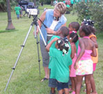 production team with some of the family's children