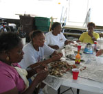 eating New Orleans food at a family picnic